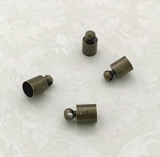 Концевик для шнура 9х5мм, вн.диам. 4,5мм (цв.бронза) 1шт